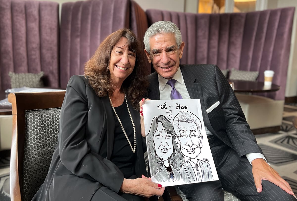 Couple having Caricature drawn at a wedding in NC.
