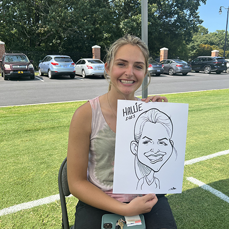 Cute college girl with a caricature.